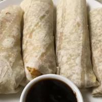 Moo Shu Vegetables · Four steamed Chinese crepes filled with shredded cabbage and carrot, bean sprouts, and onion...