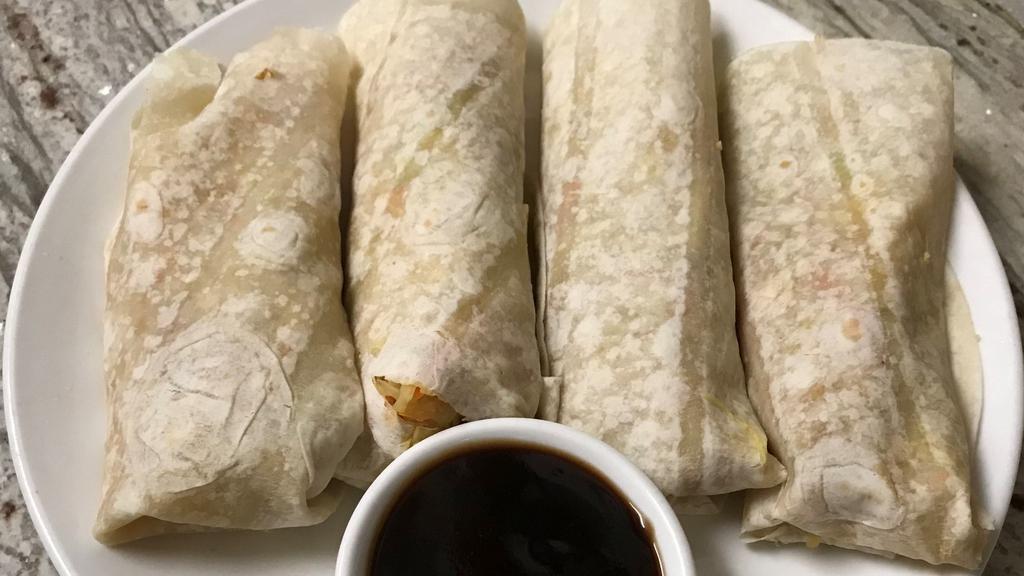 Moo Shu Vegetables · Four steamed Chinese crepes filled with shredded cabbage and carrot, bean sprouts, and onion. Served with hoisin sauce.