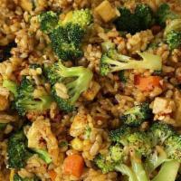 House Fried Rice · Broccoli, carrots, peas, tofu, and veg protein. White or brown rice. Try it with curry spice!