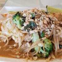 Pad Thai · Spicy. Flat rice noodles stir-fried with o medley of vegetables, bean sprouts, tofu, and veg...