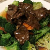 Noble Broccoli · Broccoli, carrot, and veg protein stir-fried in brown sauce.
