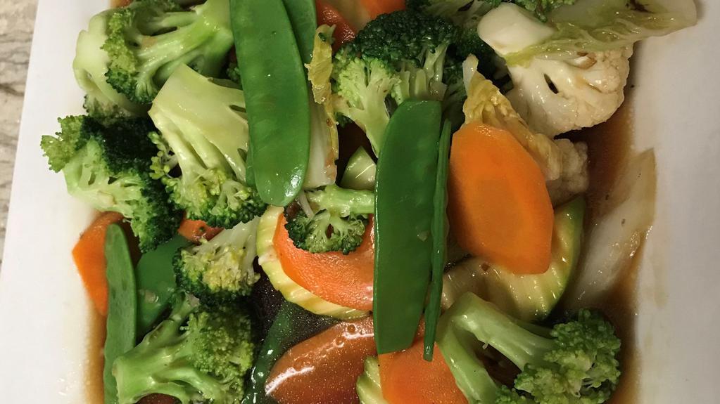 Veggie Delight · Colorful mix of broccoli, carrot, cauliflower, napa cabbage, snow peas, and zucchini.