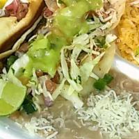 El Guero · One sonoran stilo hot dog with two mesquite grilled chicken tacos topped with cabbage, pico ...