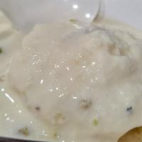 Ras Malai (2 Pcs) · Flattened balls of chana soaked in malai, flavoured with cardamom.