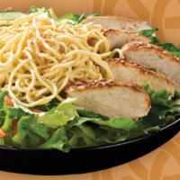 Sesame Garden Tossed Salad · Chicken breast, cucumbers, carrots and marinated yakisoba noodles on a bed of fresh lettuce.