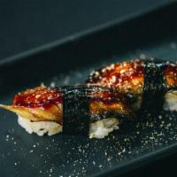 Nigiri Unagi · Yakumi: + eel sauce, ground sesame