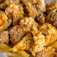 Popcorn Chicken & French Fries  · Marinated bite-sized chicken and french fries. (Cayenne spice provided on the side).