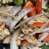 Ginger Chicken · Spicy. Sliced chicken sautéed with ginger green and red peppers and onion.