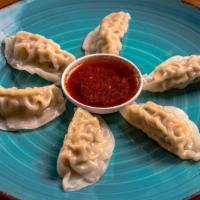 Steamed Dumplings (8 Piece) · Steamed dumplings served with spicy ponzu on the side