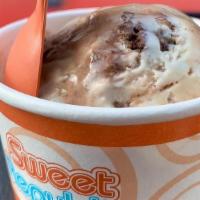Brownie Fudge Swirl Ice Cream (G) · Brownie chunks and fudge swirls in vanilla ice cream (contains dairy, soy, gluten and eggs)....