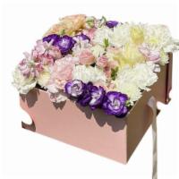 Flowers In A Square Box · Flowers in a square box that come with a transparent top and with a bow. The square boxes th...