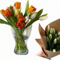 Mix Tulips 15/20/30 · Elegant fresh mix tulips bouquet is executed in spiral technique and wrapped in craft paper ...