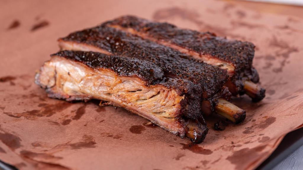 Pork Ribs (1/2 Lb) · Amount of ribs you will receive may vary depending on the total weight of each rib.  1/2lb is typically between 2 and 3 bones.  We use large st. louis spare ribs.