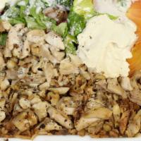 Chicken Plate · Authentic chicken recipe on a bed of saffron rice, side of tzatziki, green salad, and a choi...