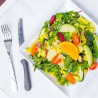 Durbar Salad · Mixed greens, beets, tomatoes, cucumber, carrots, orange, and nuts.