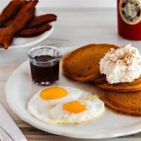 Pumpkin Pancakes · Blended with real pumpkin and spices. Served with a side of homemade whipped cream sprinkled...