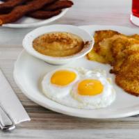 Potato Pancakes · Dollar-sized, thin and lacy. Served with your choice of sour cream or applesauce on the side.