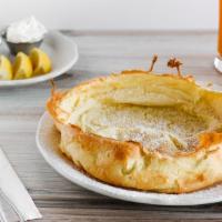 Dutch Baby · Homemade german batter, oven-baked until light, airy and golden brown. Served with whipped b...