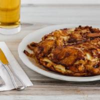 Apple Pancake · Homemade german batter, oven-baked with sliced granny smith apples, clarified butter, cinnam...