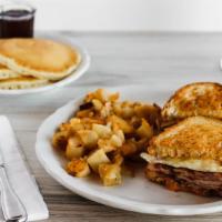 Build A Breakfast Sandwich · All sandwiches are made on grilled sourdough bread with our signature house spread and overh...
