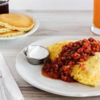 Sweet Bell Pepper Omelette · Bell pepper, onion, and pepper jack cheese. Served with a side of chipotle salsa and sour cr...