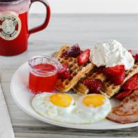 Fresh Strawberry Waffle · Served with a side of fresh-cut strawberries, homemade whipped cream and strawberry syrup.
