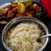 Chicken Dashi Kabob · Marinated boneless chicken breast charbroiled in tandoor and served in a sizzling pan with o...