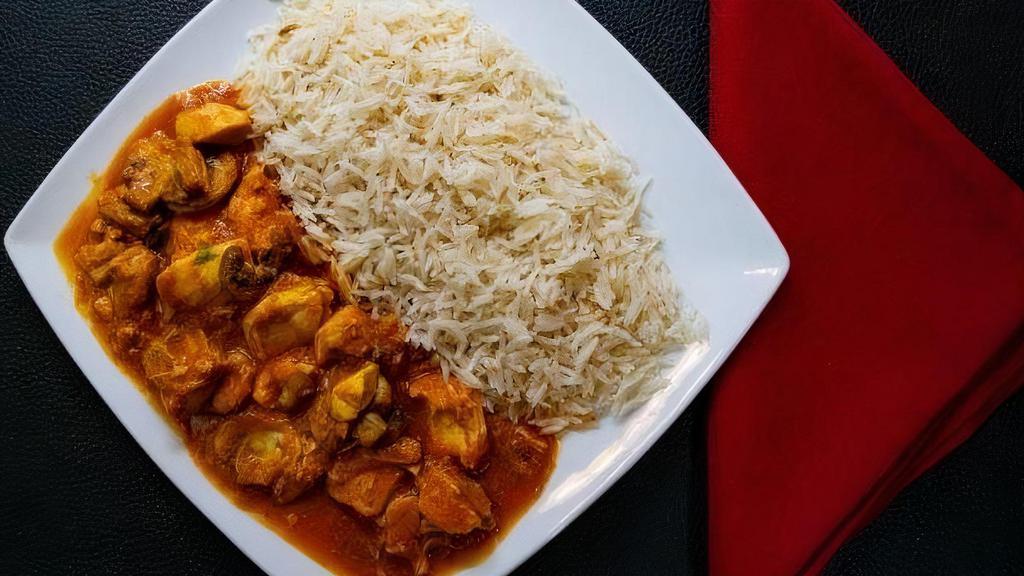 Chicken Mushroom · Boneless chicken cooked with mushrooms, garlic, onions, ginger, tomatoes, and spices served with rice.