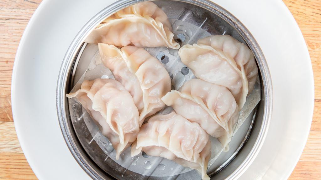 Grant'S Steamed Pork Dumplings · Homemade steamed dumplings with ground pork, Napa cabbage, green onions and ginger (6 pcs).