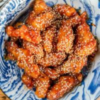 Sesame Chicken · Spicy. Lightly breaded deep-fried chicken in a sweet and spicy sesame sauce.