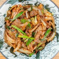 Mongolian Beef · Spicy. A mix of green onions and yellow onions, stir fried in a spicy brown sauce.