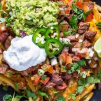 Loaded Fries  · Our seasoned french fries with your choice of meat or beans. Topped with cheese, guacamole, ...