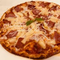 Hawaiian · Ham, Pineapple & Cheese + Pizza sauce.        
Hulahula the best from the Island.