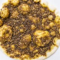 Zatar · dried thyme, sumac, sesame seeds and olive oil. (vegan)
