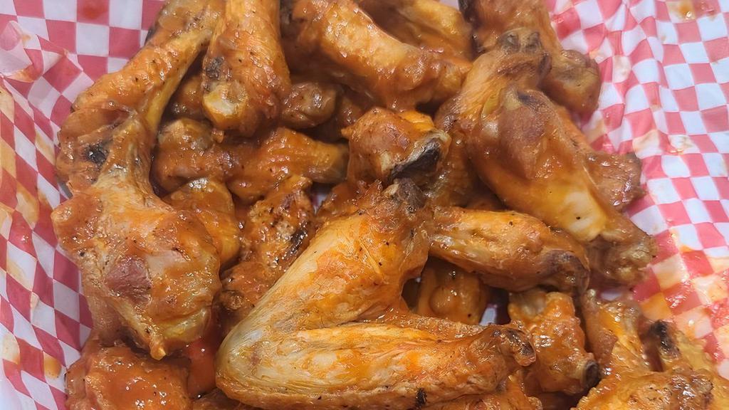 Buffalo Wings (16Pc) · Our buffalo style wings are tossed in any our signature sauces. (choose up to two sauces).