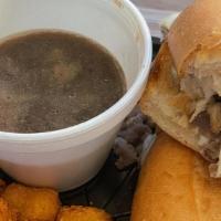French Dip · Thinly sliced prime rib beef, Mozzarella, hoagie roll, au jus. Served with your choice of on...