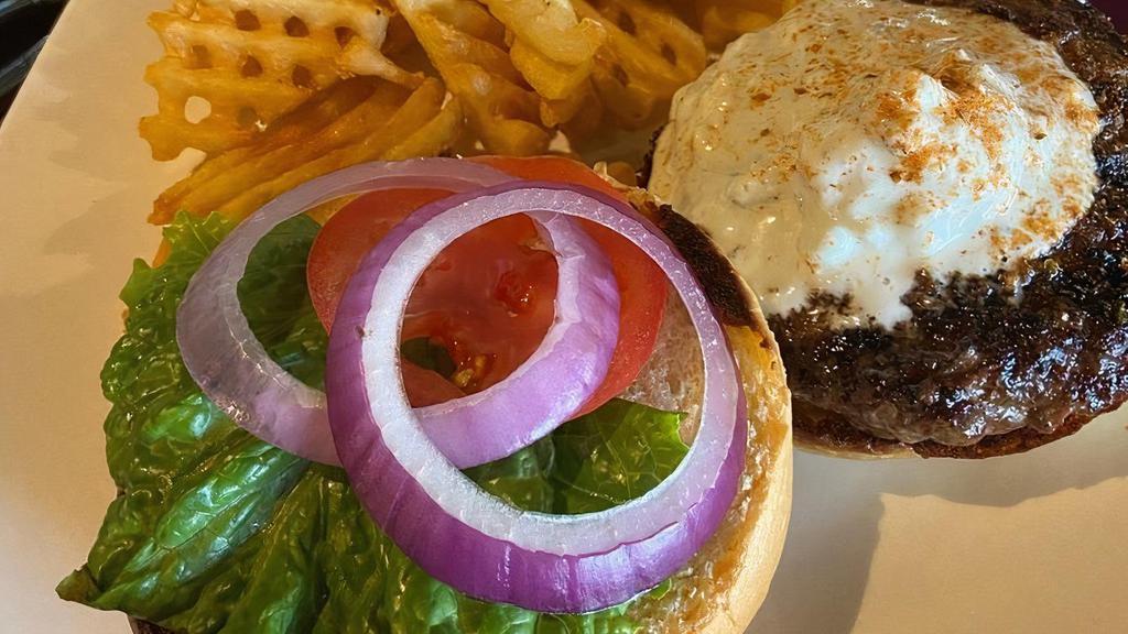 Black & Bleu Burger · Blackened seasonings, Bleu cheese crumbles, lettuce, tomato, red onion. Served with your choice of one side.