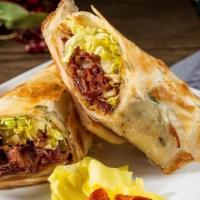 Beef Pancake Roll (1) · Grilled pancake roll stuffed with shredded lettuce, beef, and our non-spicy house sauce.