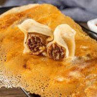 Beef Pot Stickers (6) · Pan-fried dumplings filled with 100% natural beef.
