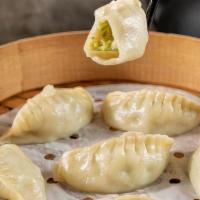 Zucchini Shrimp Dumplings (6) · Steamed dumplings with refreshing zucchini and shrimp. This combination is a match made in h...