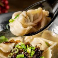 Chicken Veggie Wonton In Chicken Broth · Succulent hand-made wontons filled with seasoned chicken and veggies swimming in a flavorful...