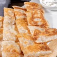 Banana Naan Bread (1) · Banana naan bread with whipped cream is a sweet recreation of traditional naan bread using f...