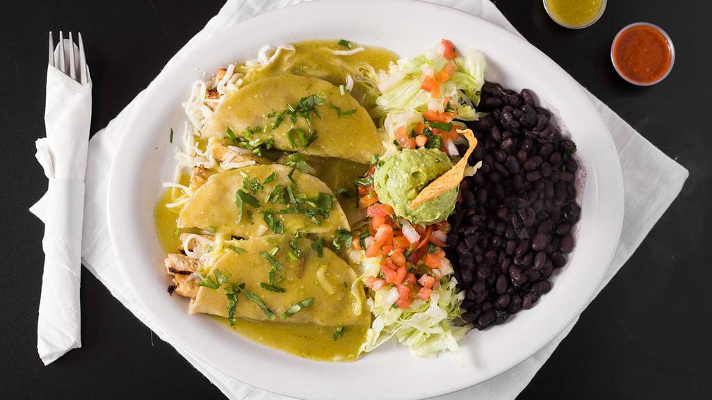 Gaby'S Enchilada · Served with corn tortilla, choice of meat, topped with green salsa, cilantro, served with beans, cheese, lettuce, salsa fresca and guacamole.