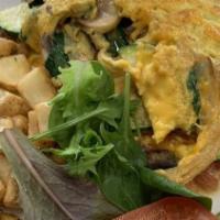 Veggie Omelet · 3 eggs, peppers, mushrooms, zucchini, spinach, tomato & cheddar cheese.
