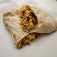 Breakfast Burrito · Scrambled eggs, yellow american cheese, hash browns, and  green chili.