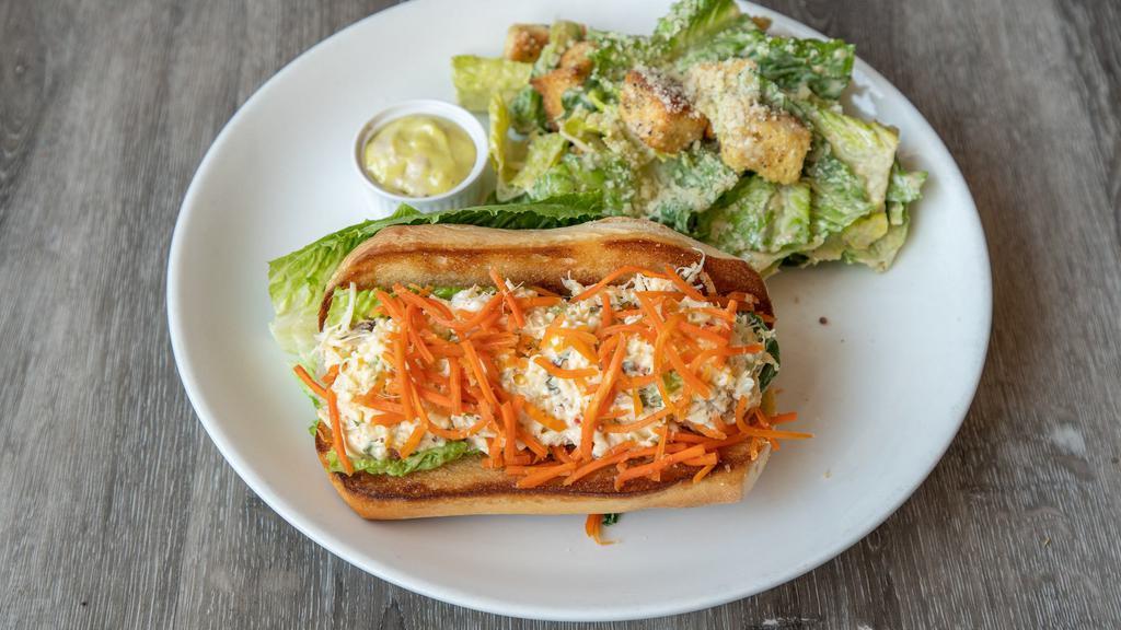 Dungeness Crab Sandwich · Dungeness Crab mixed with basil, aioli, sweet peppers, and a hint of wasabi. Ginger Carrots, Lettuce.