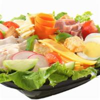 Chef Salad · Julienned black forest ham, roasted turkey breast, Swiss cheese and American cheese over a f...