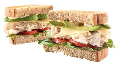 Roasted Turkey & Avocado · Thinly-Sliced Roast Turkey Breast with Sliced Fresh Avocado and Swiss Cheese on Thick Whole Wheat Deli Sliced Bread.