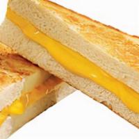 Grilled Cheese · Melty American Cheese inside toasted white bread