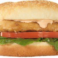 Fried Chicken Sandwich · Breaded Chicken Breasts with Freshly Sliced Tomatoes, Lettuce, and Apollo Sauce on a Cornmea...